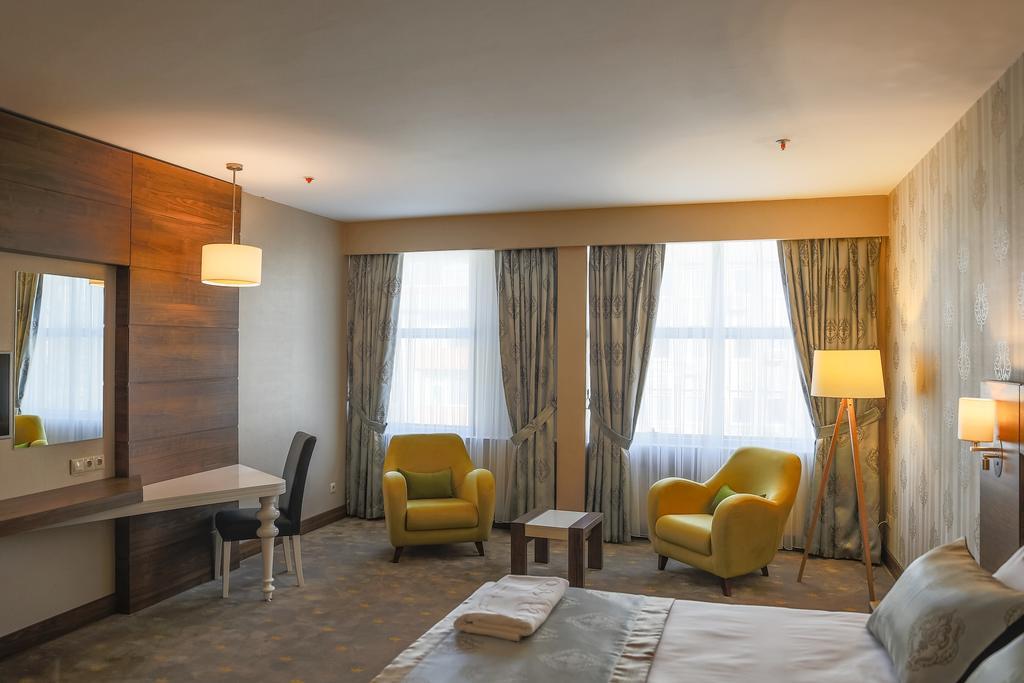 Royal Hotel Инегель Номер фото